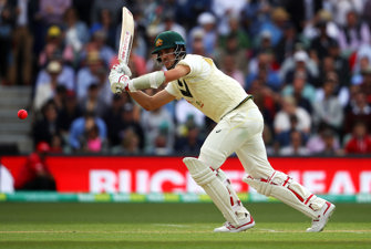 Pat Cummins batting at criket game